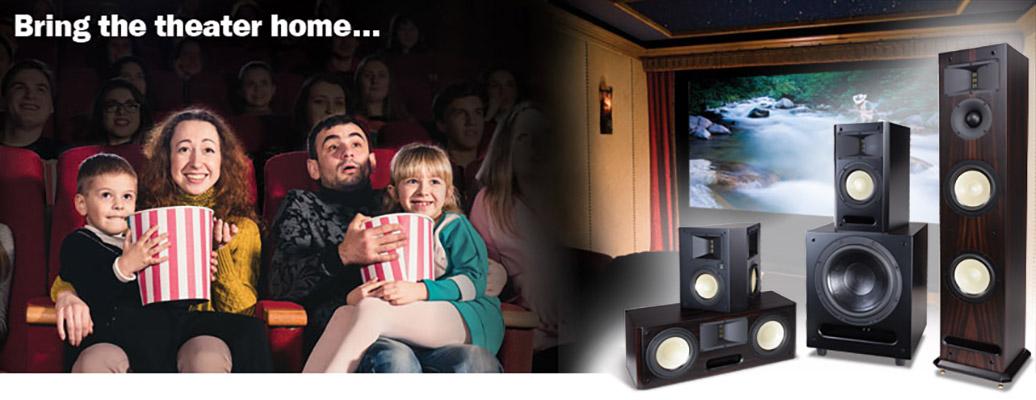 Family watching a movie in a theater